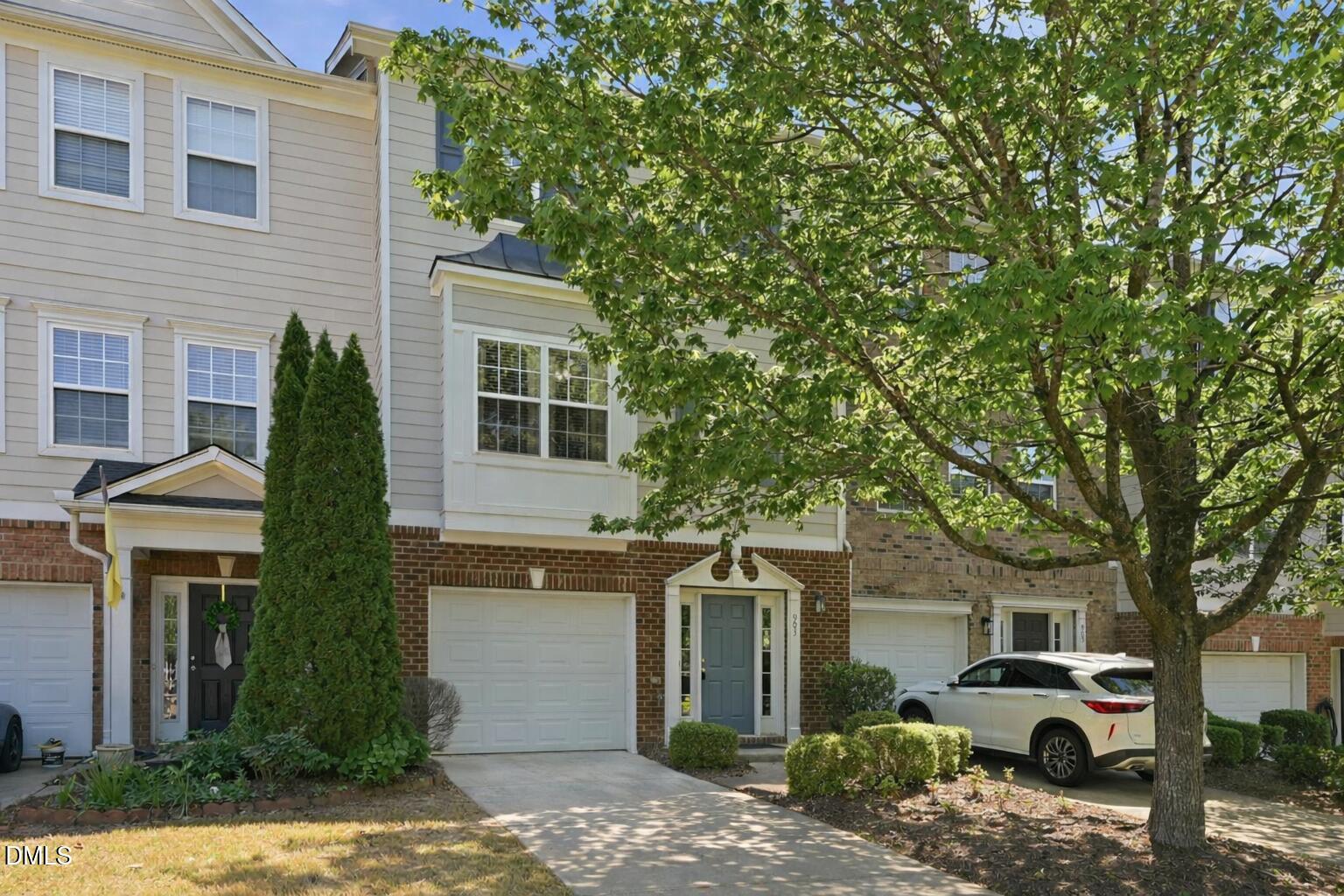 903 Straywhite Avenue Apex, NC 27539 - Photo 2 of 37 a view of a car park in front of a house