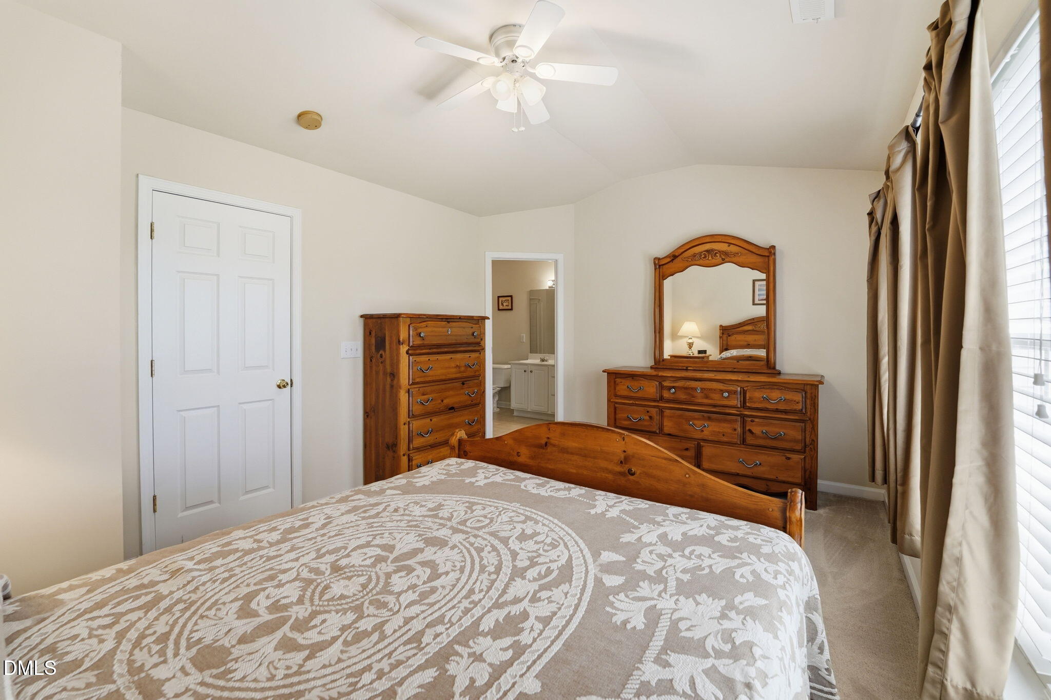903 Straywhite Avenue Apex, NC 27539 - Photo 21 of 37 a bedroom with a bed and a dresser