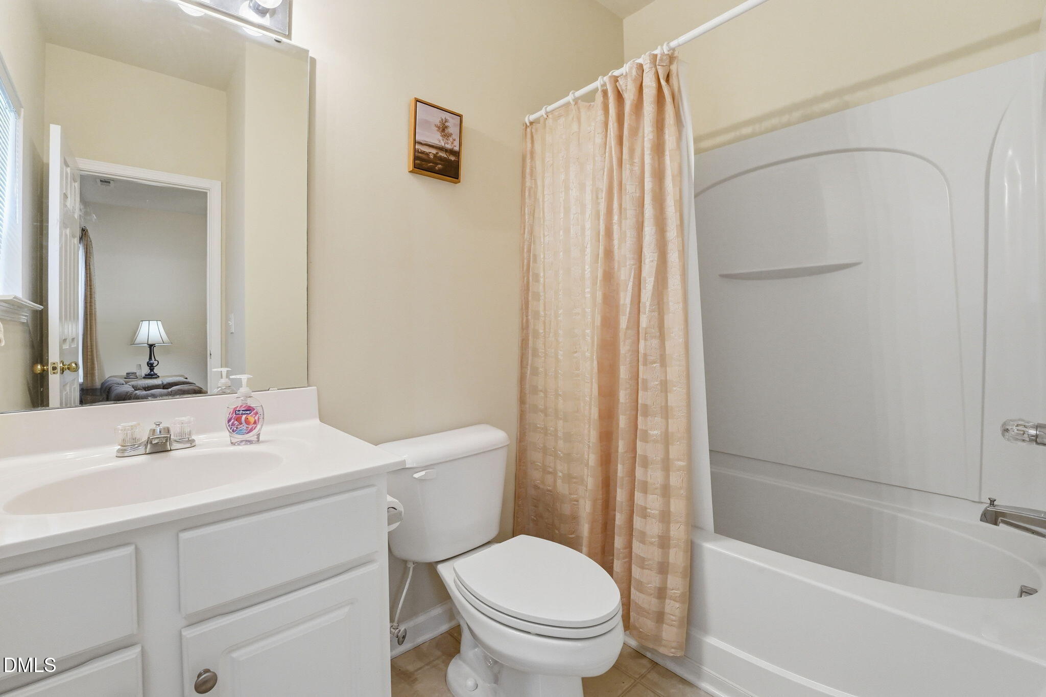 903 Straywhite Avenue Apex, NC 27539 - Photo 26 of 37 a bathroom with a sink toilet and shower
