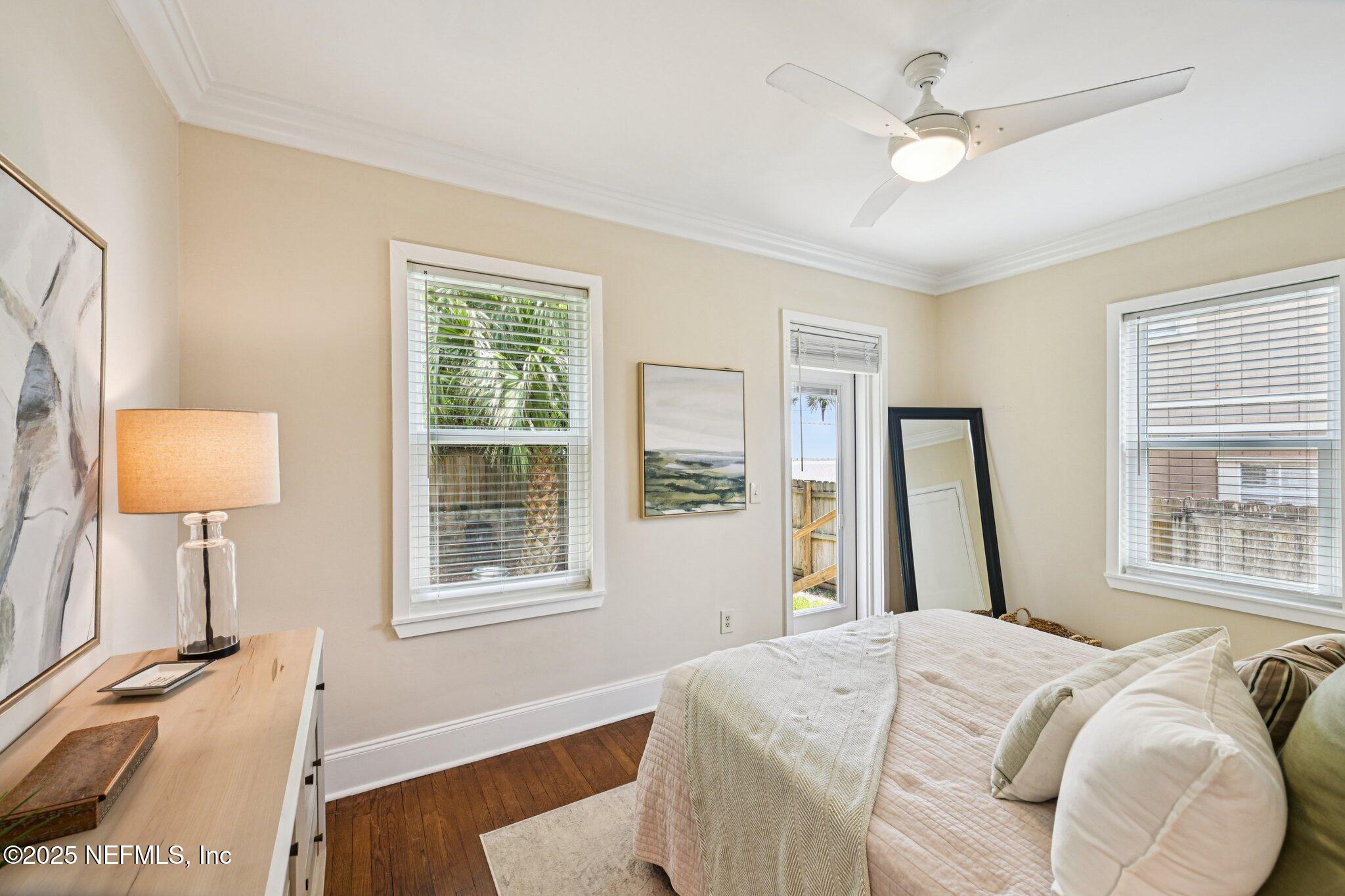 113 Seminole Road Atlantic Beach, FL 32233 - Photo 25 of 52 a bed sitting in a bedroom next to a window
