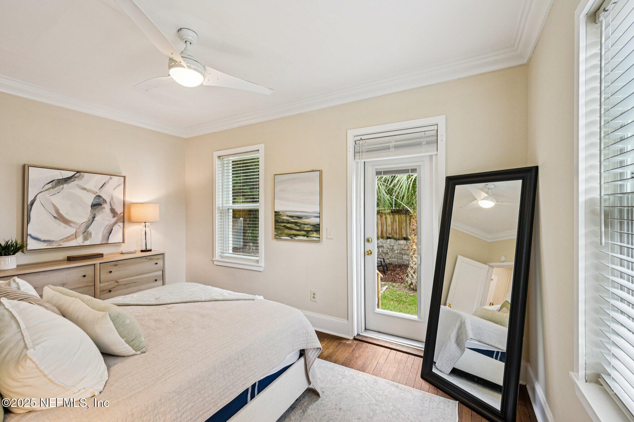 113 Seminole Road Atlantic Beach, FL 32233 - Photo 27 of 52 a bedroom with a bed and a window