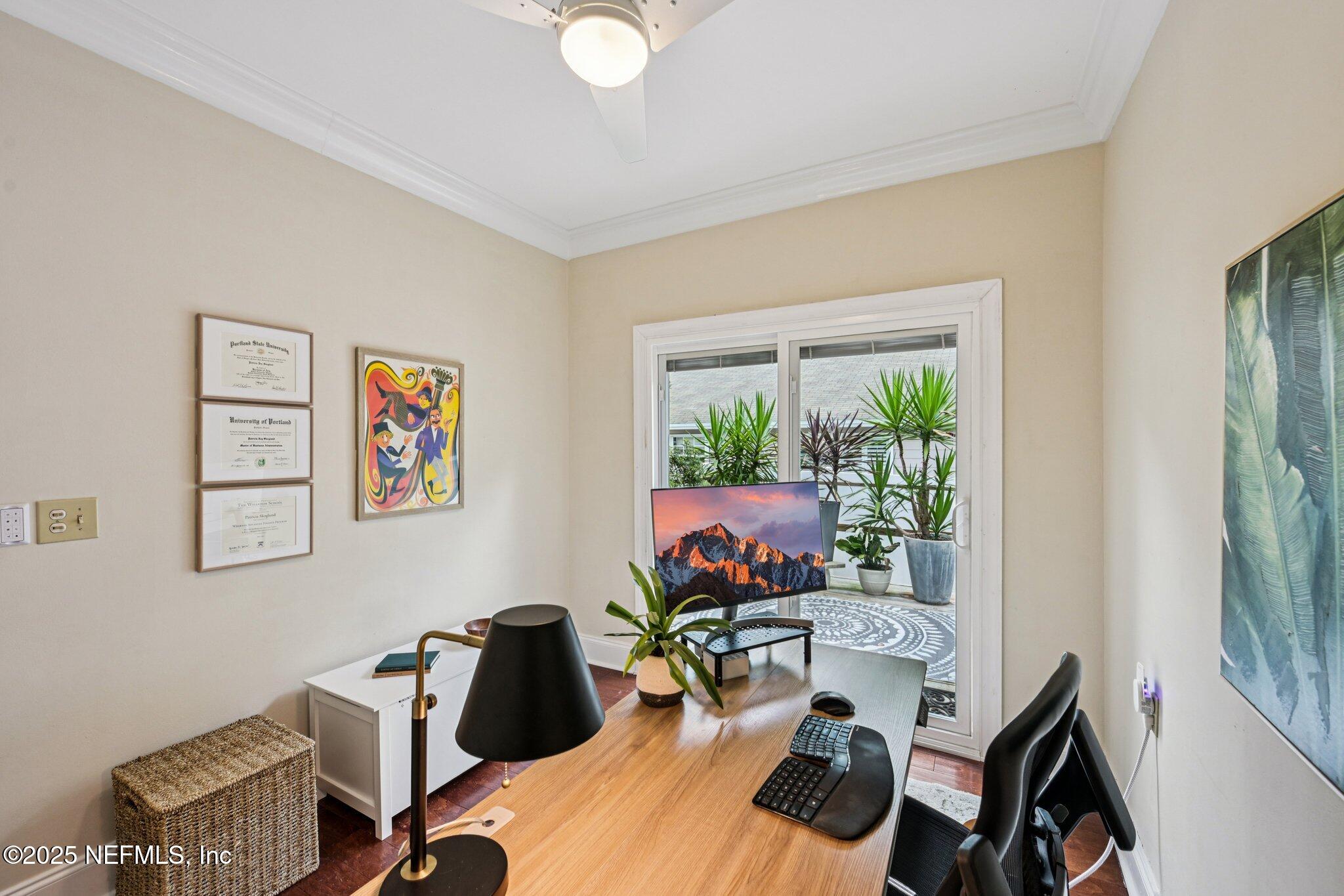 113 Seminole Road Atlantic Beach, FL 32233 - Photo 29 of 52 a living room with furniture and a flat screen tv