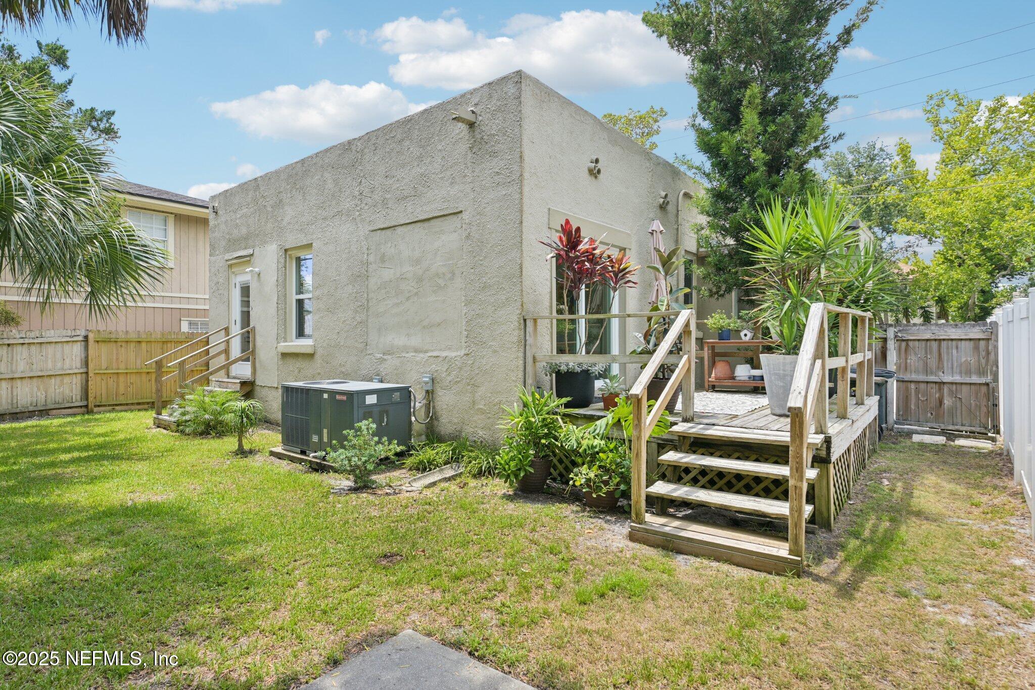 113 Seminole Road Atlantic Beach, FL 32233 - Photo 31 of 52 a view of a house with backyard and sitting area