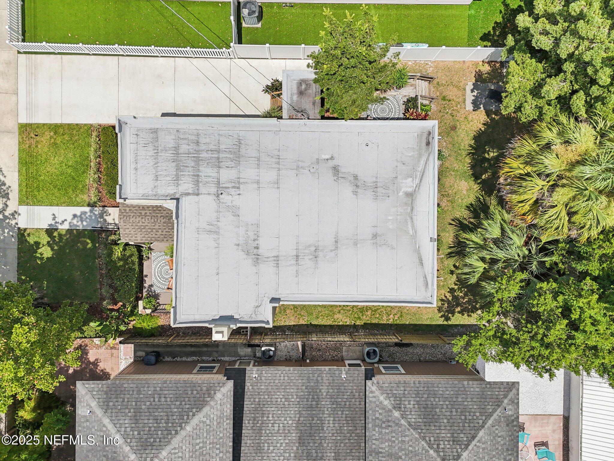 113 Seminole Road Atlantic Beach, FL 32233 - Photo 38 of 52 an aerial view of a house with a yard