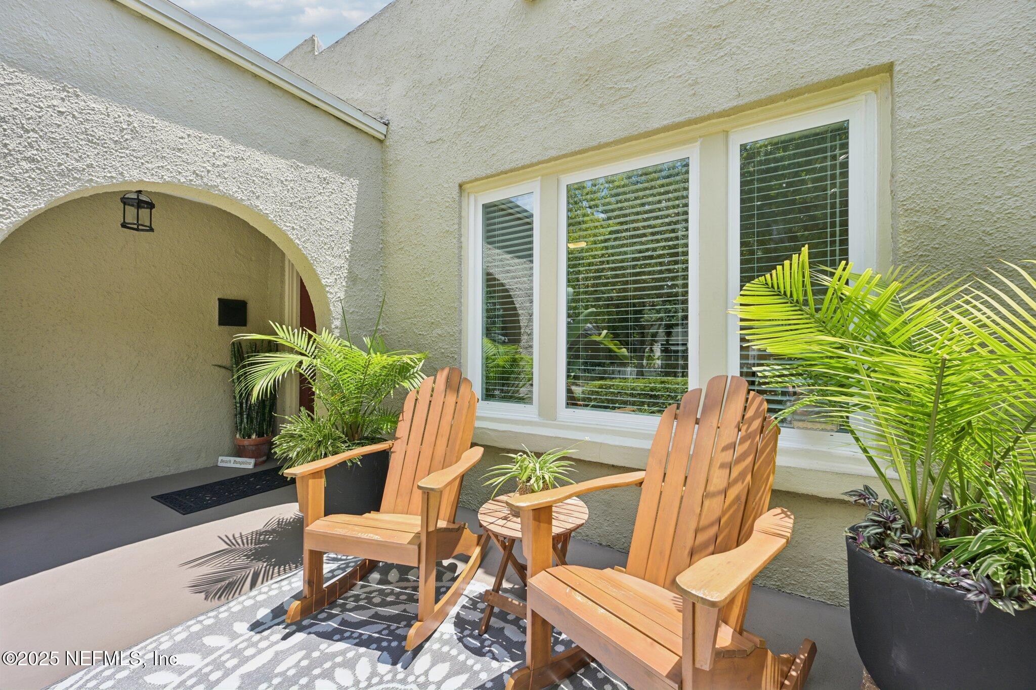113 Seminole Road Atlantic Beach, FL 32233 - Photo 4 of 52 a view of a chair and table in the balcony