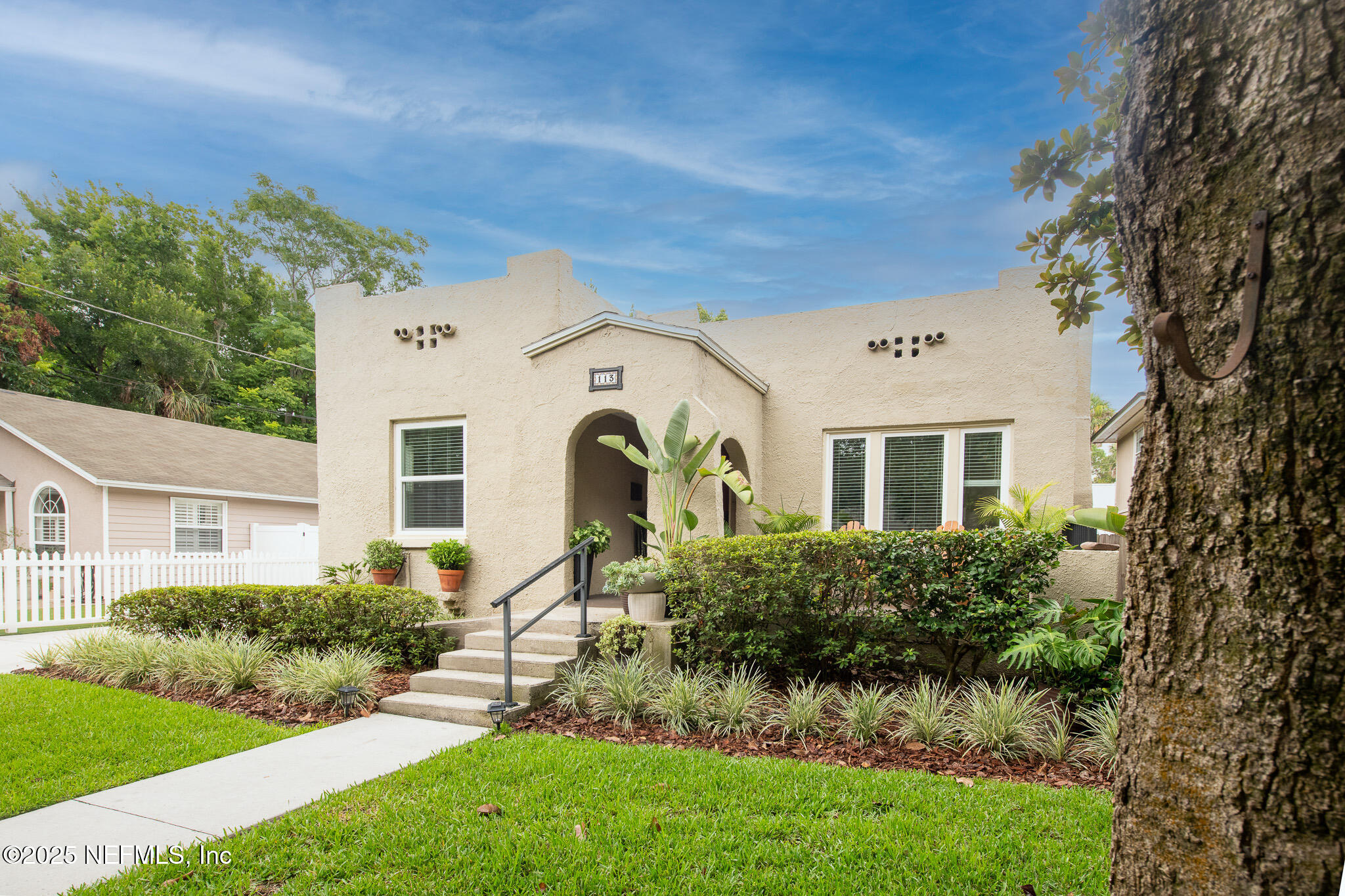 113 Seminole Road Atlantic Beach, FL 32233 - Photo 47 of 52 a front view of a house with a yard