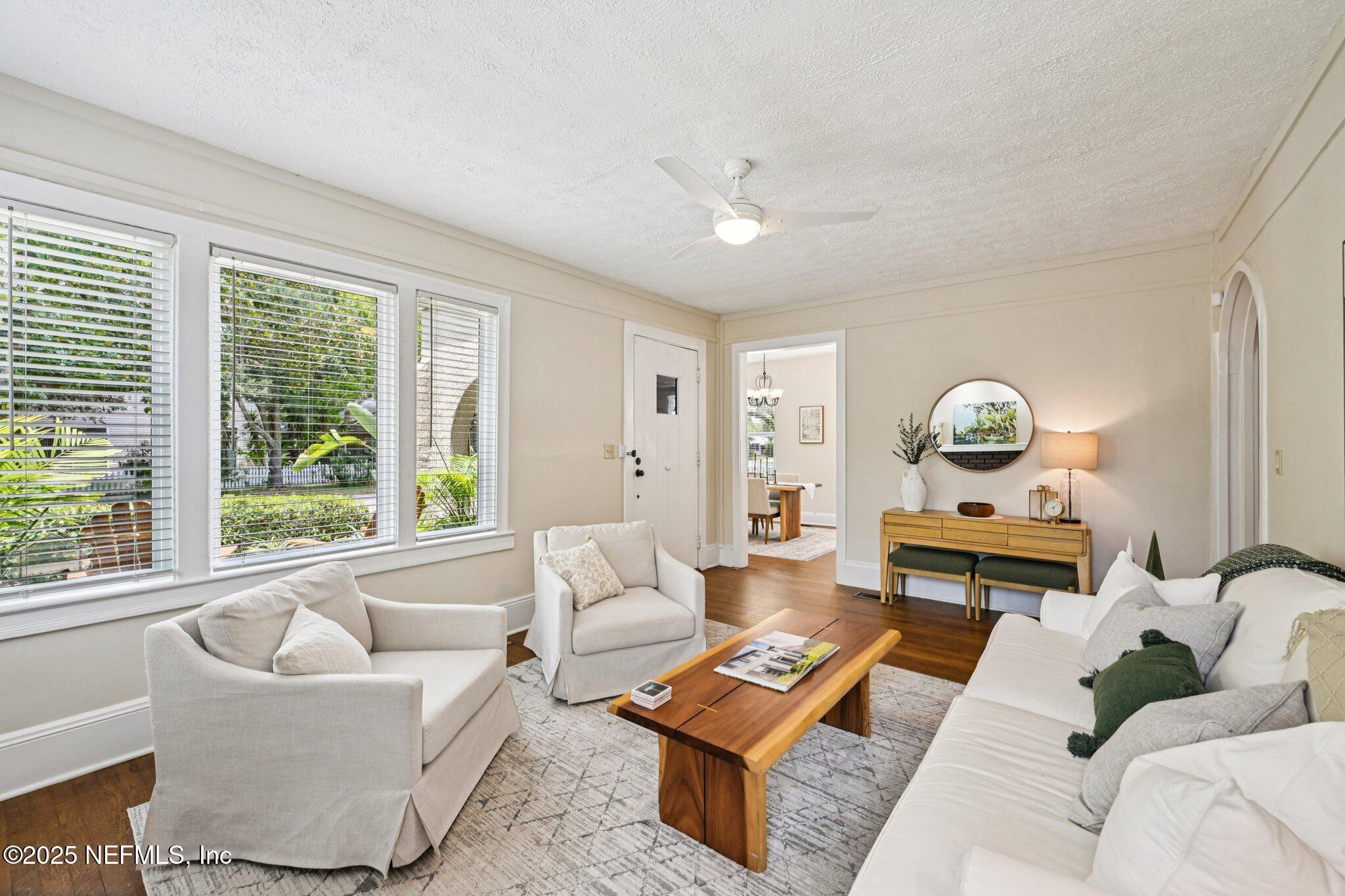 113 Seminole Road Atlantic Beach, FL 32233 - Photo 9 of 52 a living room with furniture and a window