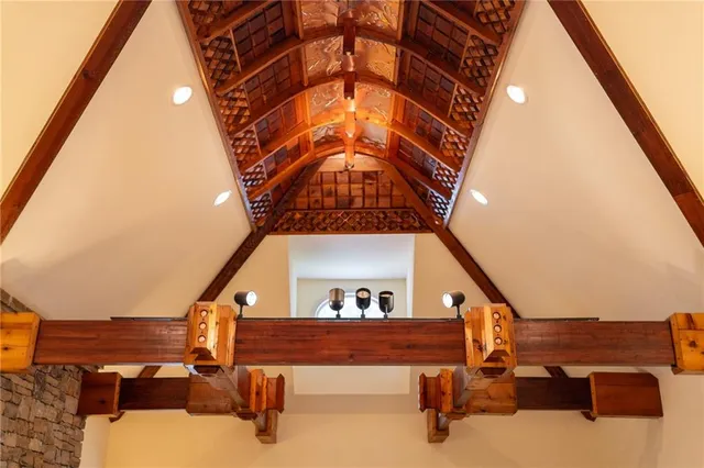 a bedroom with a bed and a table