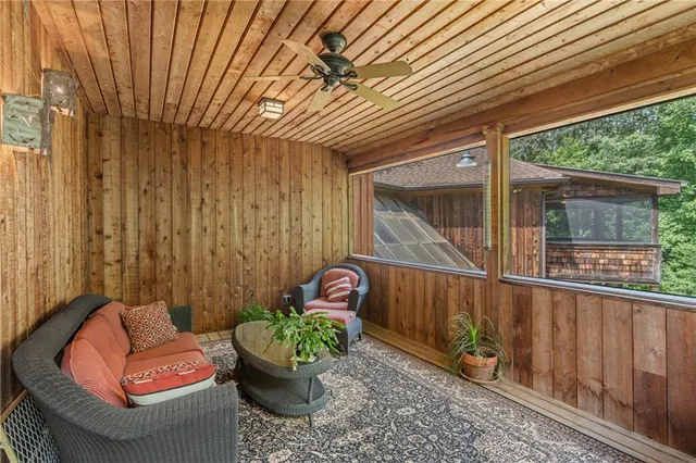 a view of a car park in front of a house
