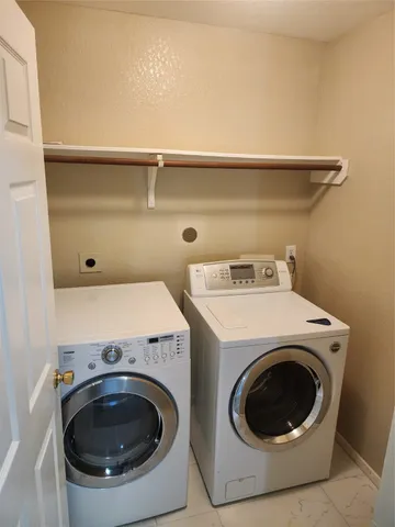 a bathroom with a mirror and a bathtub