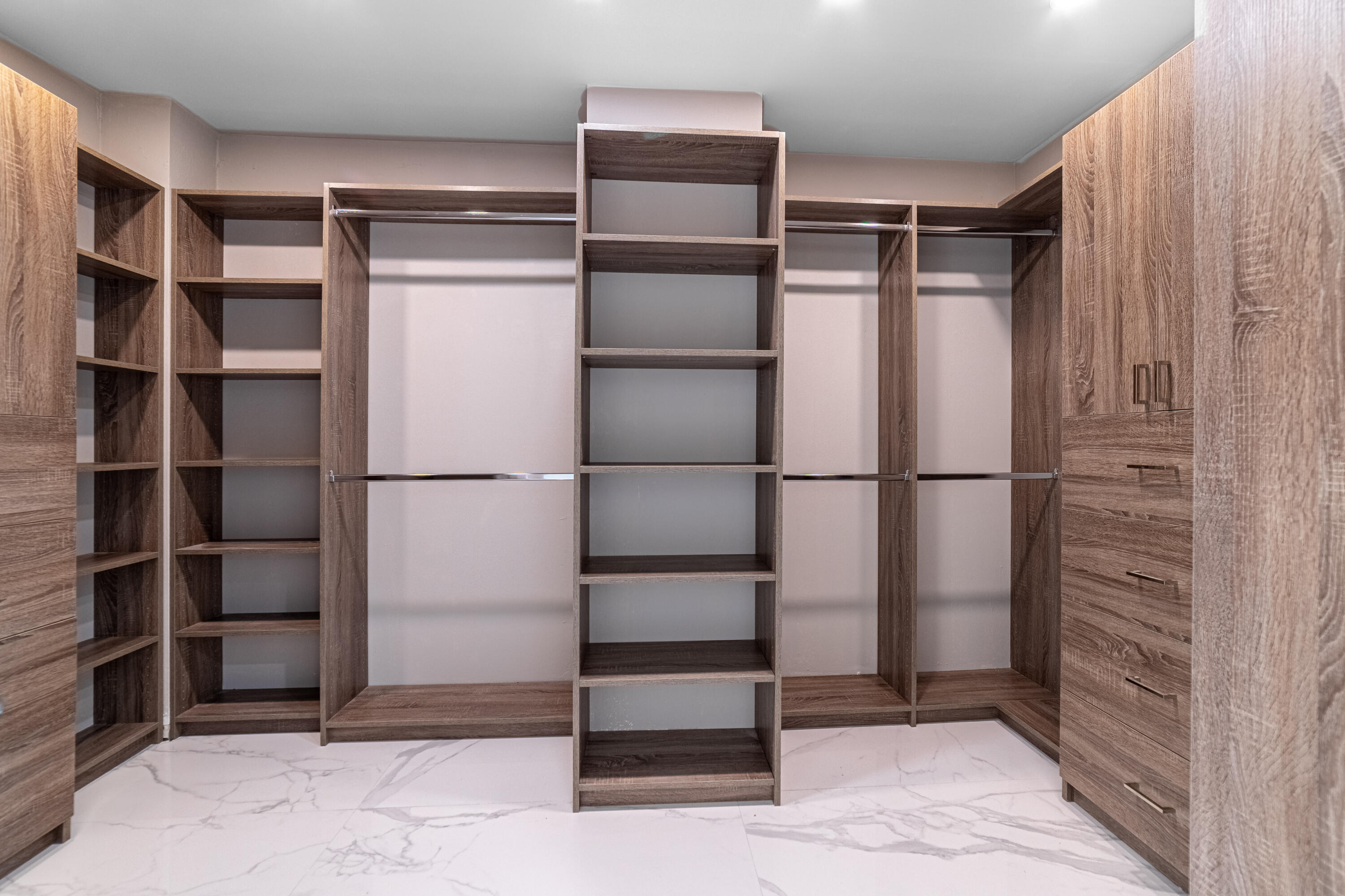 3474 South Ocean Boulevard, Unit 2 Palm Beach, FL 33480 - Photo 31 of 37 a view of walk in closet with empty racks