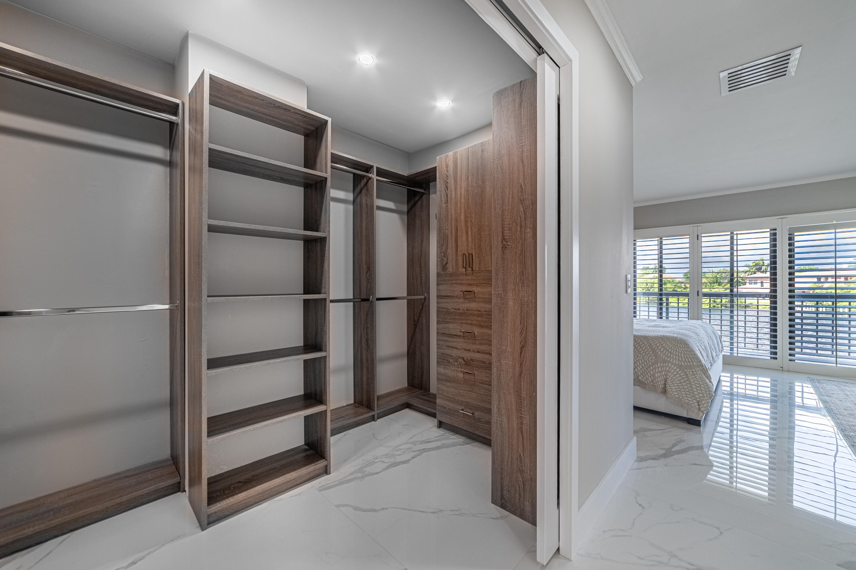 3474 South Ocean Boulevard, Unit 2 Palm Beach, FL 33480 - Photo 33 of 37 a view of walk in closet with empty racks