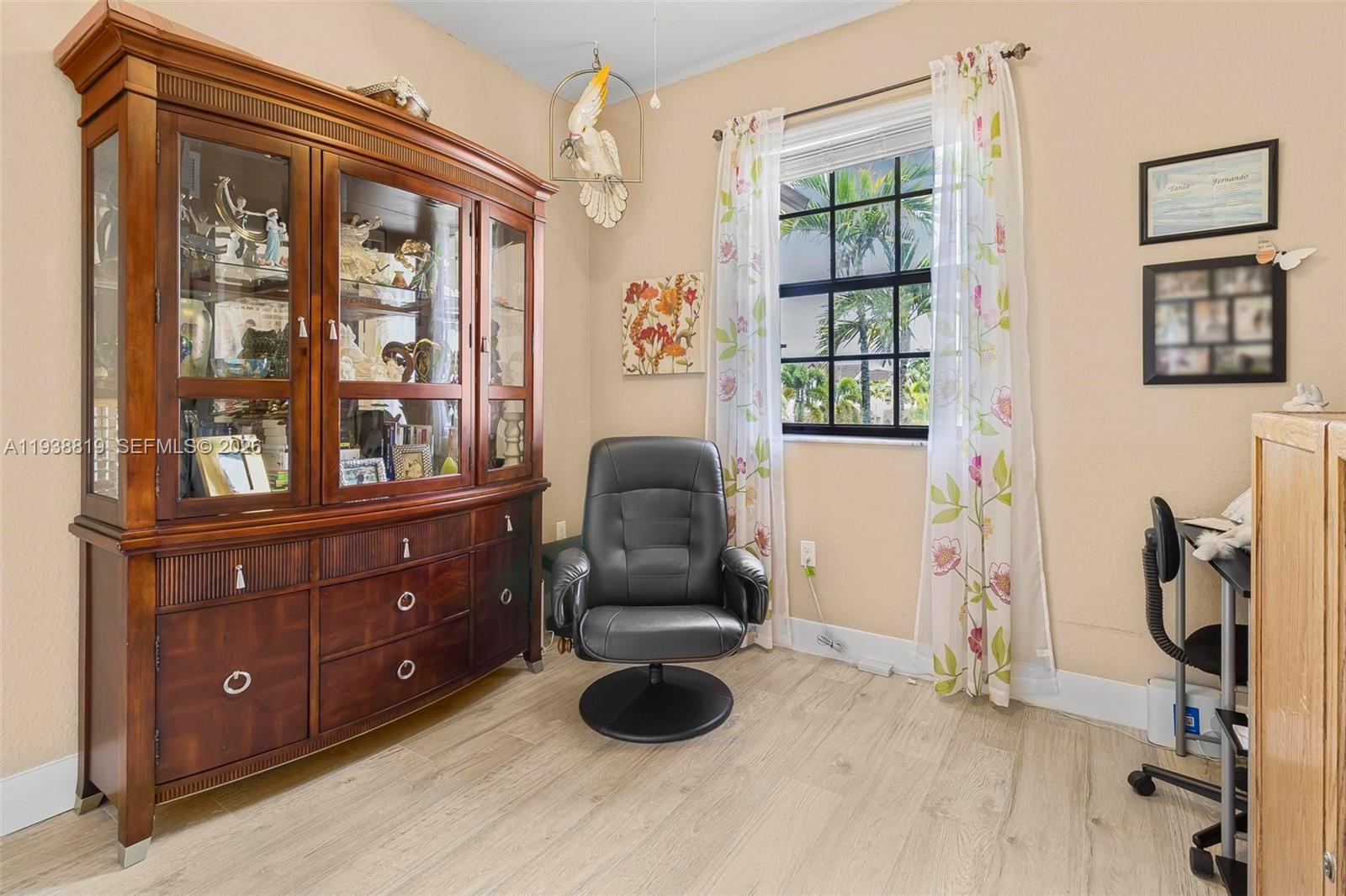 3780 Northeast 3rd Court Homestead, FL 33033 - Photo 17 of 34 a living room with furniture and a window