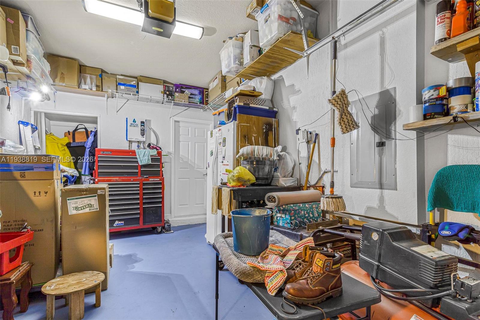 3780 Northeast 3rd Court Homestead, FL 33033 - Photo 22 of 34 a room with furniture and gym equipment