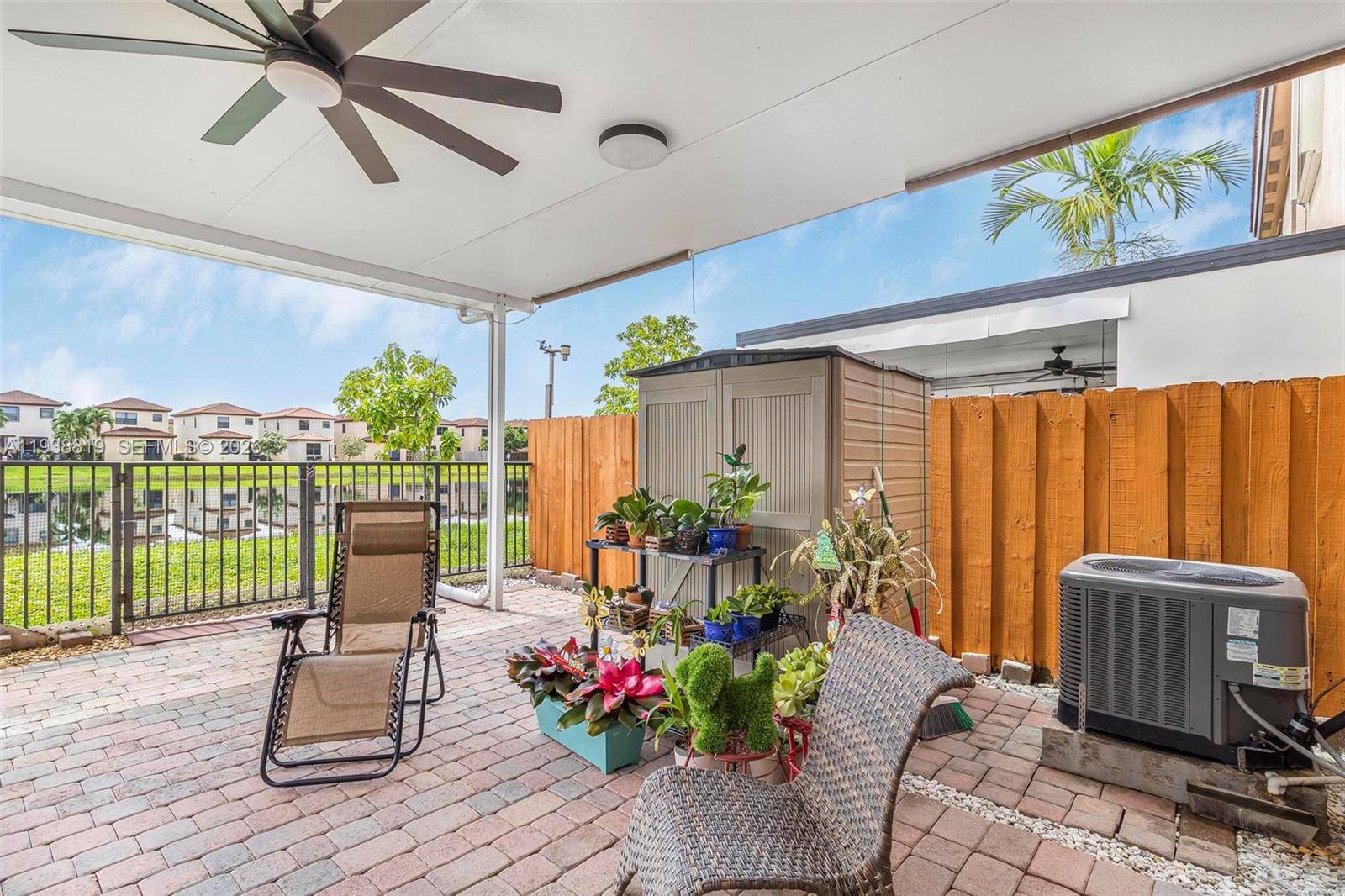 3780 Northeast 3rd Court Homestead, FL 33033 - Photo 25 of 34 a living room with furniture and a potted plant