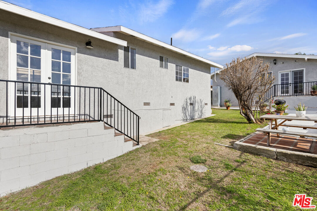 735 Orme Avenue Los Angeles, CA 90023 - Photo 18 of 33 a view of a house with a backyard