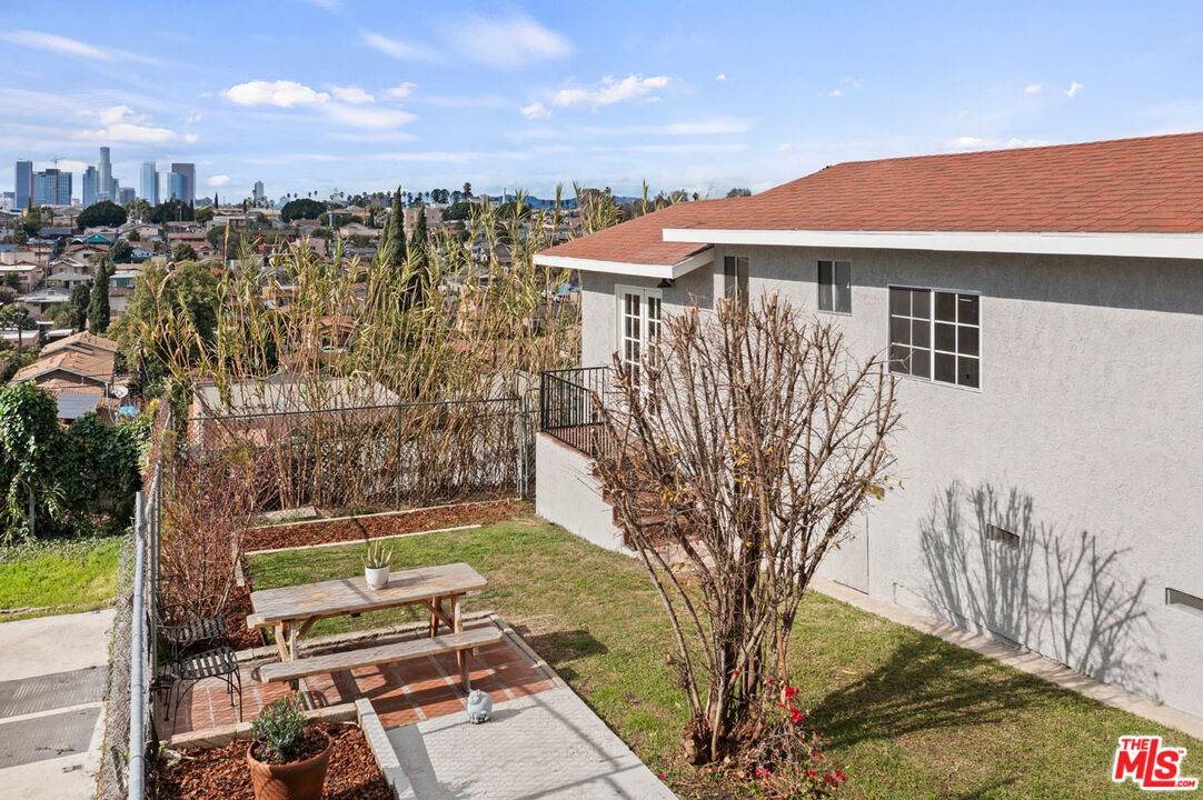 735 Orme Avenue Los Angeles, CA 90023 - Photo 25 of 33 a view of a backyard with plants