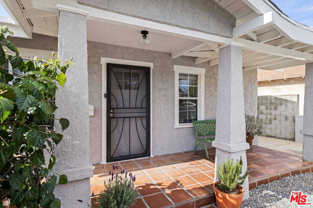 735 Orme Avenue Los Angeles, CA 90023 - Photo 3 of 33 a front view of a house