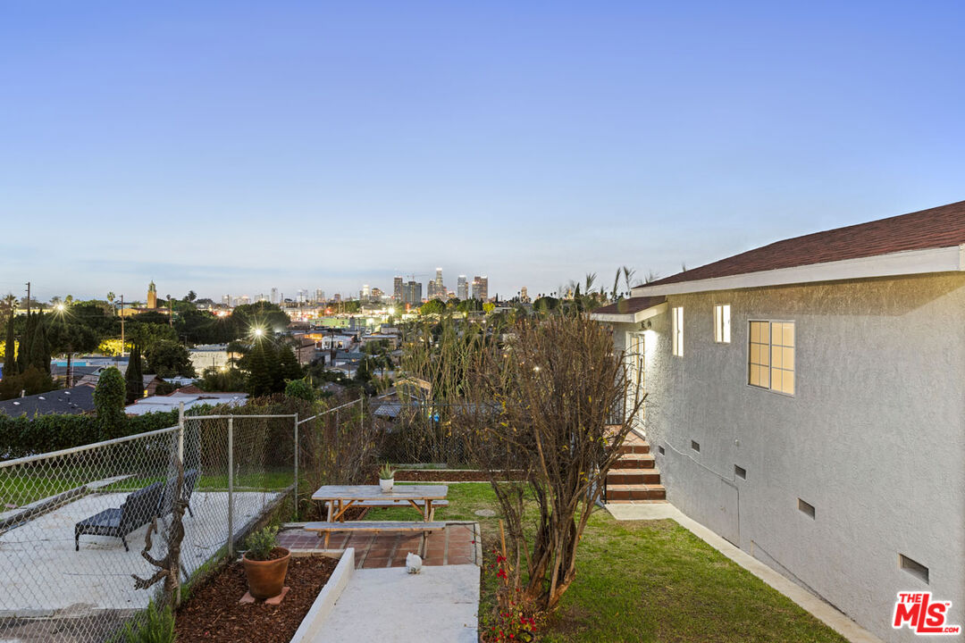 735 Orme Avenue Los Angeles, CA 90023 - Photo 31 of 33 a view of a balcony with yard