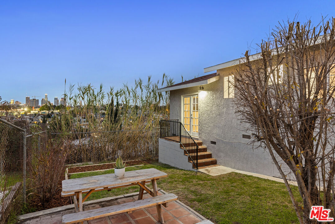735 Orme Avenue Los Angeles, CA 90023 - Photo 33 of 33 a view of a backyard with plants and a patio