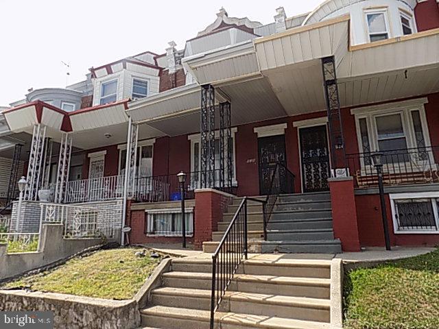 838 South 56th Street Philadelphia, PA 19143 - Photo 1 of 29 a view of a building with many windows