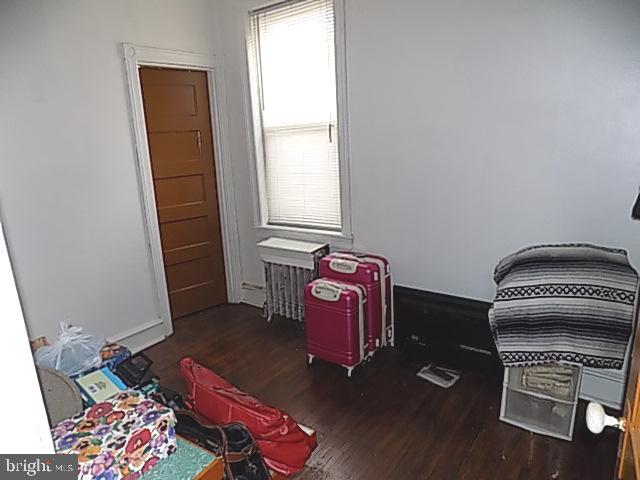 838 South 56th Street Philadelphia, PA 19143 - Photo 22 of 29 a living room with furniture and a window