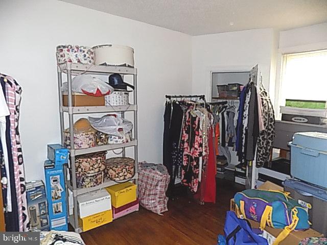 838 South 56th Street Philadelphia, PA 19143 - Photo 26 of 29 a view of walk in closet with clothes and shoes