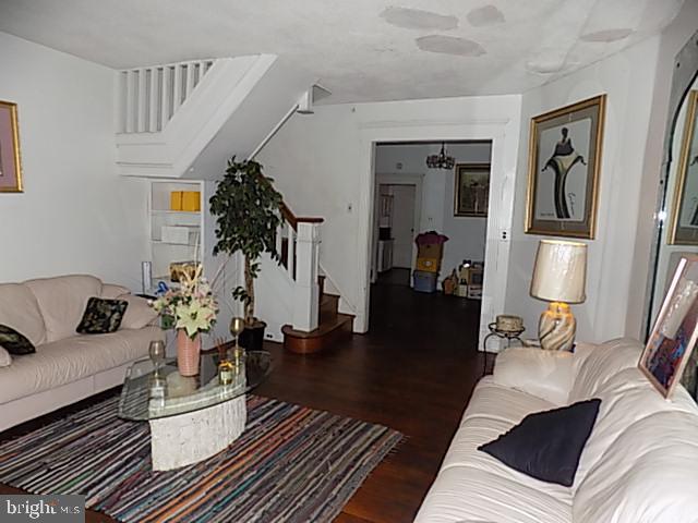 838 South 56th Street Philadelphia, PA 19143 - Photo 4 of 29 a living room with furniture and wooden floor
