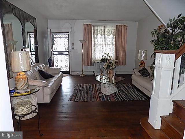 838 South 56th Street Philadelphia, PA 19143 - Photo 8 of 29 a living room with furniture rug and window