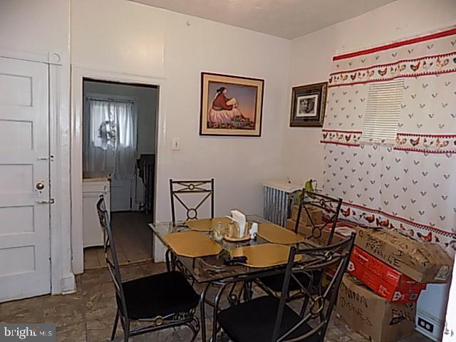 838 South 56th Street Philadelphia, PA 19143 - Photo 9 of 29 a view of a dining room with furniture