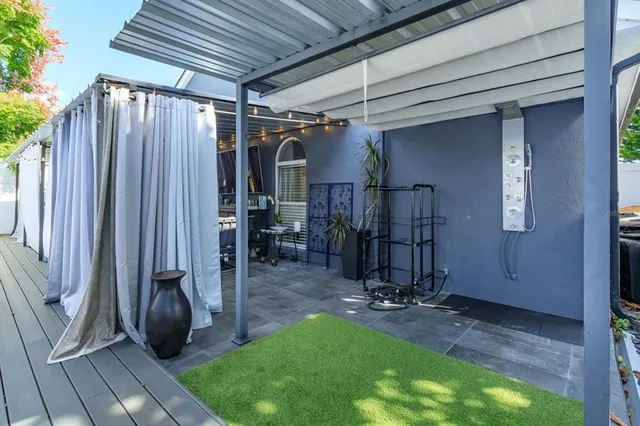 a view of a backyard of the house