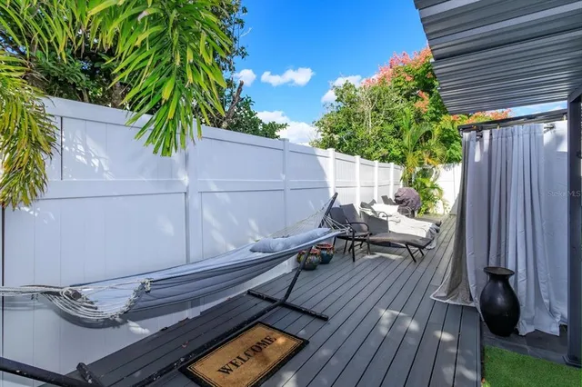 a backyard of a house with seating space
