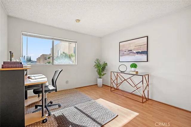 a workspace with furniture and window