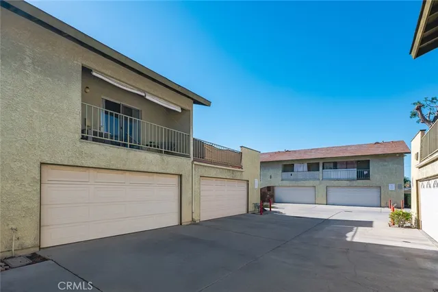 a front view of a house with a garage