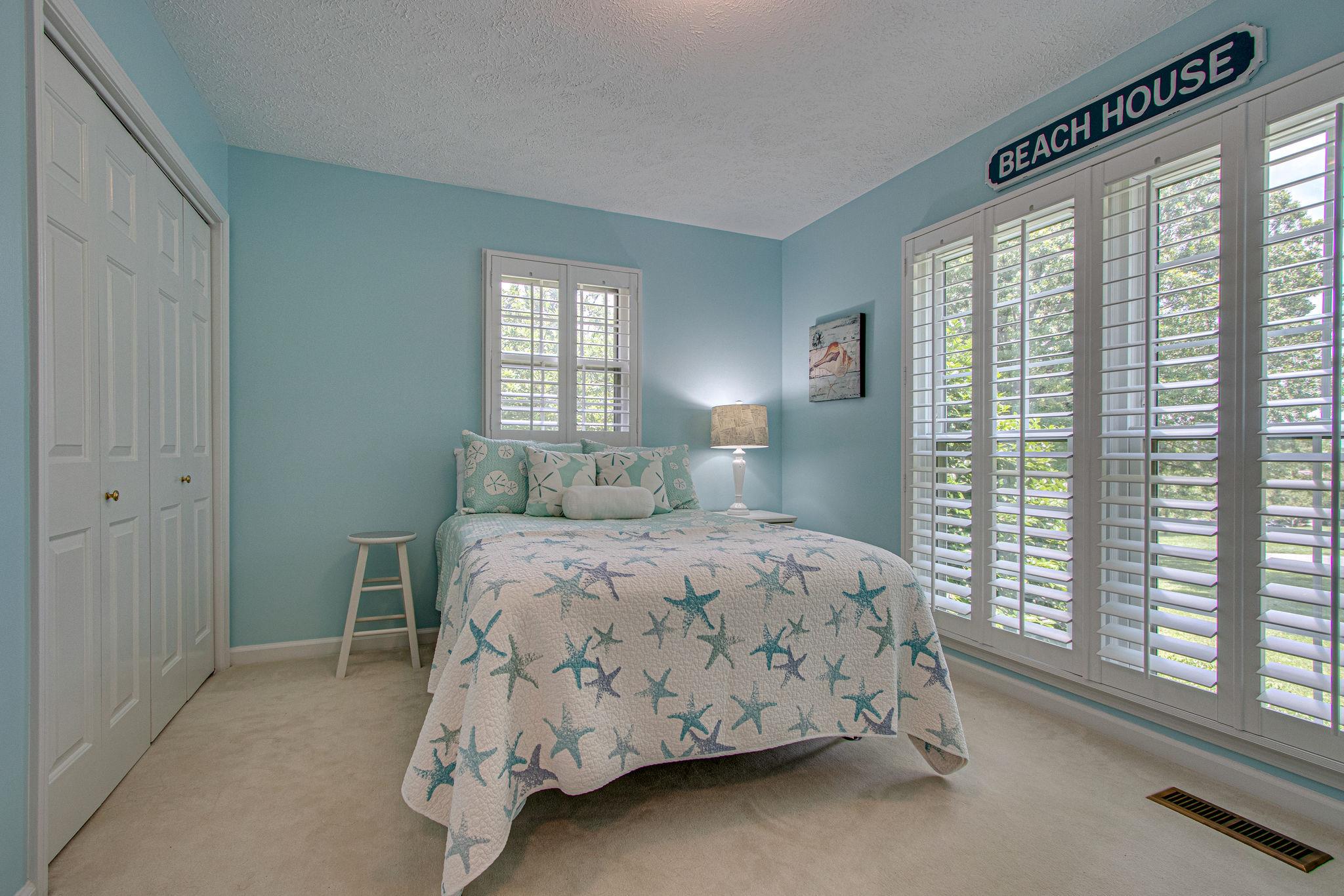 5214 Rustic Way Old Hickory, TN 37138 - Photo 21 of 30 The second bedroom has lots of windows, a large closet, and plantation shutters!