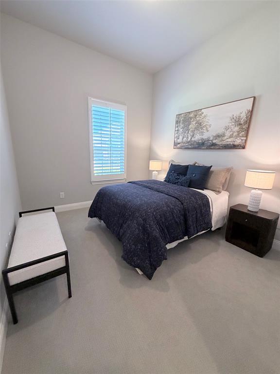2425 Eclipse Place Celina, TX 75009 - Photo 23 of 40 Carpeted room featuring a single window with white plantation shutters, light-toned wall paint, and a white baseboard