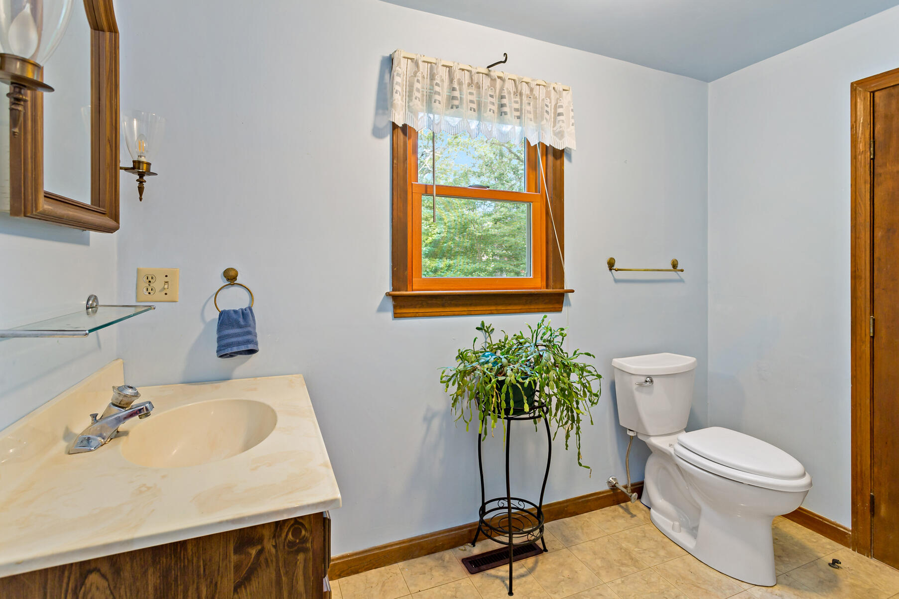 294 Salt Rock Road Barnstable, MA 02630 - Photo 14 of 32 a bathroom with a sink toilet and a mirror