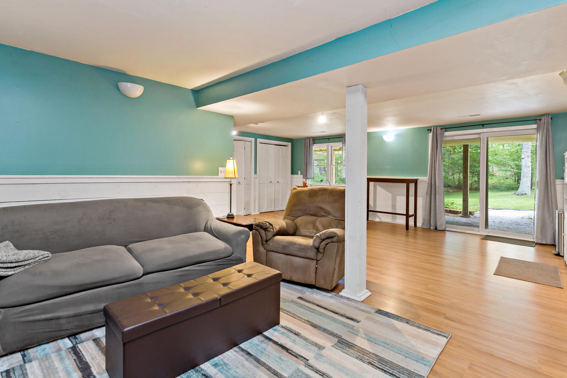 294 Salt Rock Road Barnstable, MA 02630 - Photo 19 of 32 a living room with furniture and a large window