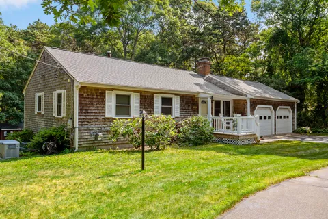 a view of a house with a deck
