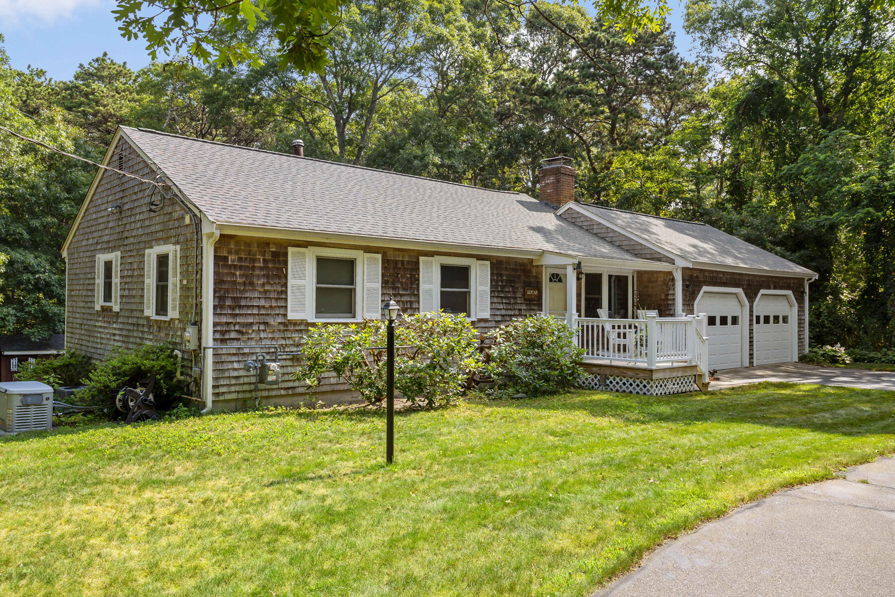 294 Salt Rock Road Barnstable, MA 02630 - Photo 24 of 32 a front view of house with yard and green space