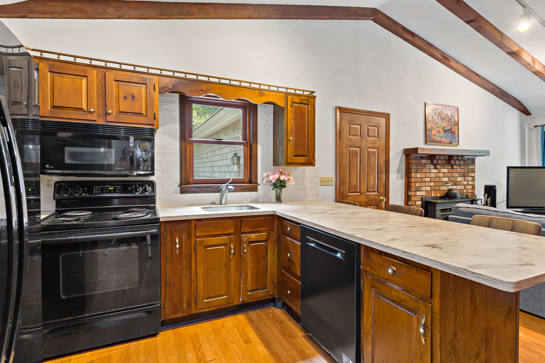 294 Salt Rock Road Barnstable, MA 02630 - Photo 6 of 32 a kitchen with stainless steel appliances granite countertop a stove and a sink