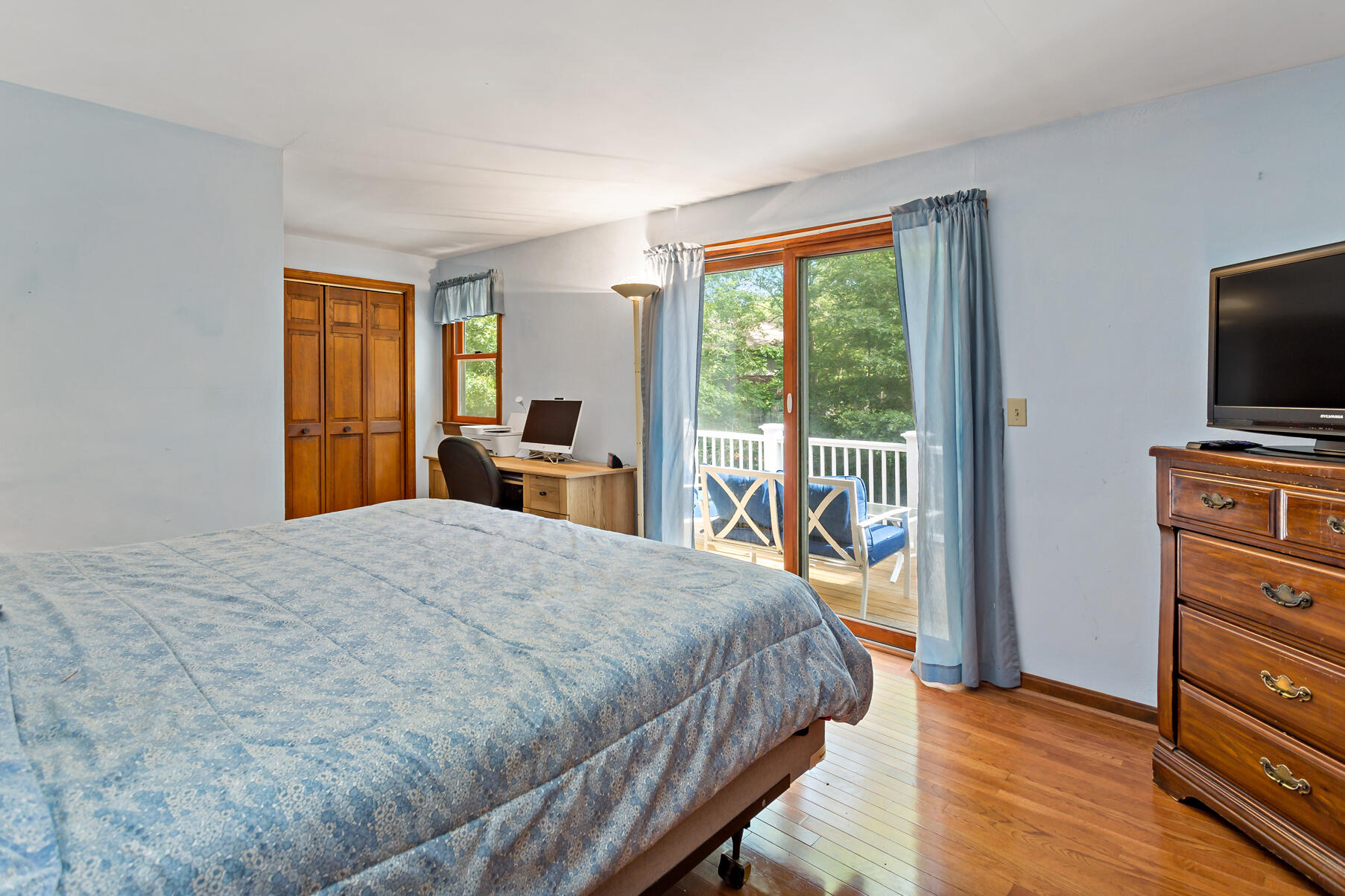 294 Salt Rock Road Barnstable, MA 02630 - Photo 8 of 32 a bedroom with a bed and wooden floor