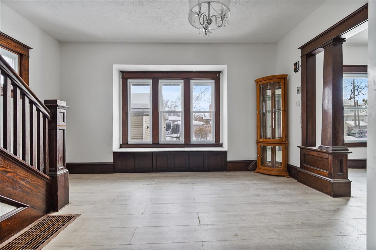 104 Magoun Street Bloomington, IL 61701 - Photo 13 of 28 a view of an empty room with window and furniture