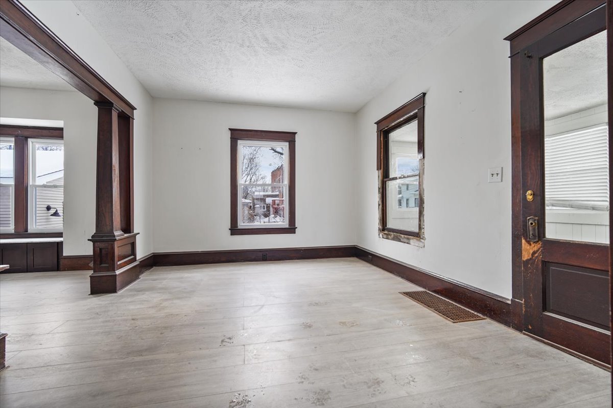 104 Magoun Street Bloomington, IL 61701 - Photo 3 of 28 an empty room with windows