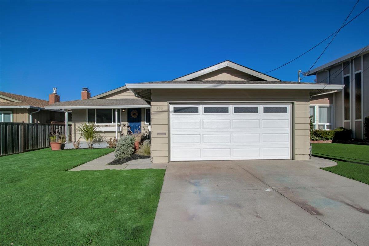 855 Standish Road Pacifica, CA 94044 - Photo 39 of 77 a front view of a house with a yard and garage