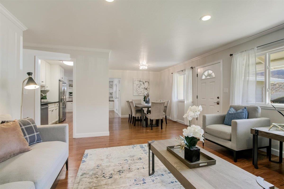 855 Standish Road Pacifica, CA 94044 - Photo 4 of 77 a living room with furniture and a table