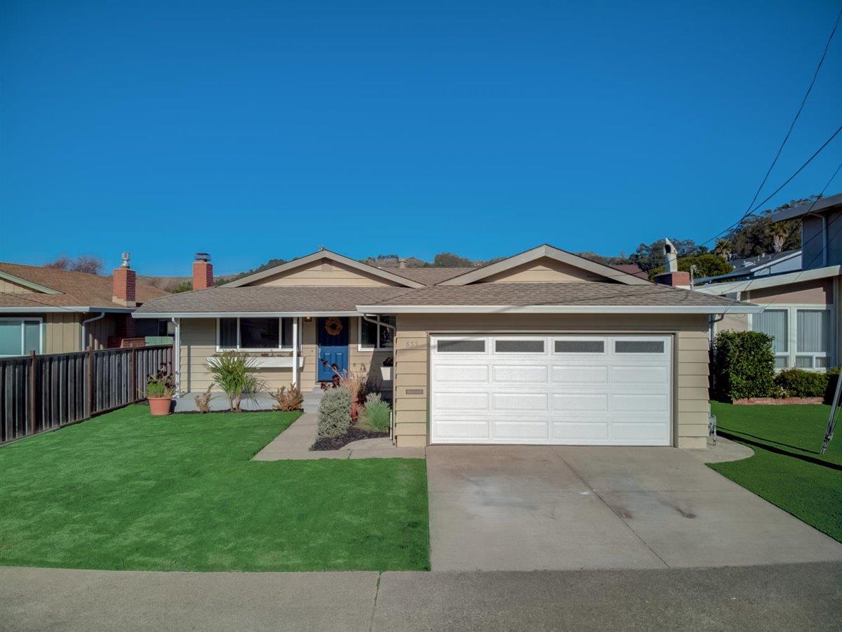 855 Standish Road Pacifica, CA 94044 - Photo 53 of 77 a front view of a house with a garden and yard