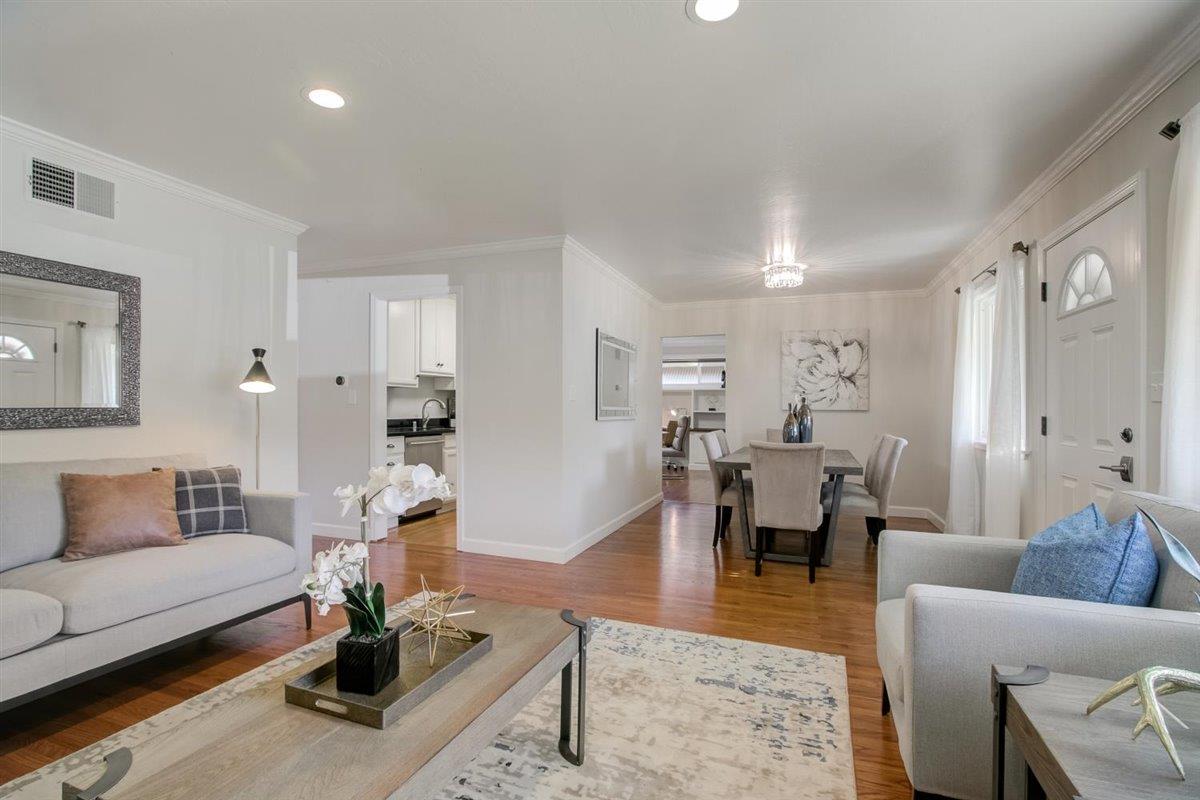 855 Standish Road Pacifica, CA 94044 - Photo 6 of 77 a living room with furniture wooden floor and a table
