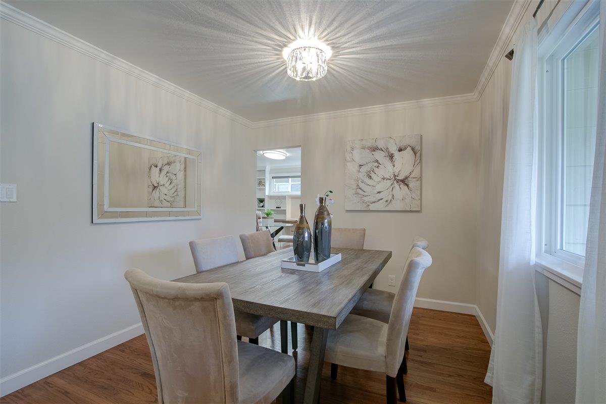 855 Standish Road Pacifica, CA 94044 - Photo 74 of 77 a view of a dining room with furniture and wooden floor