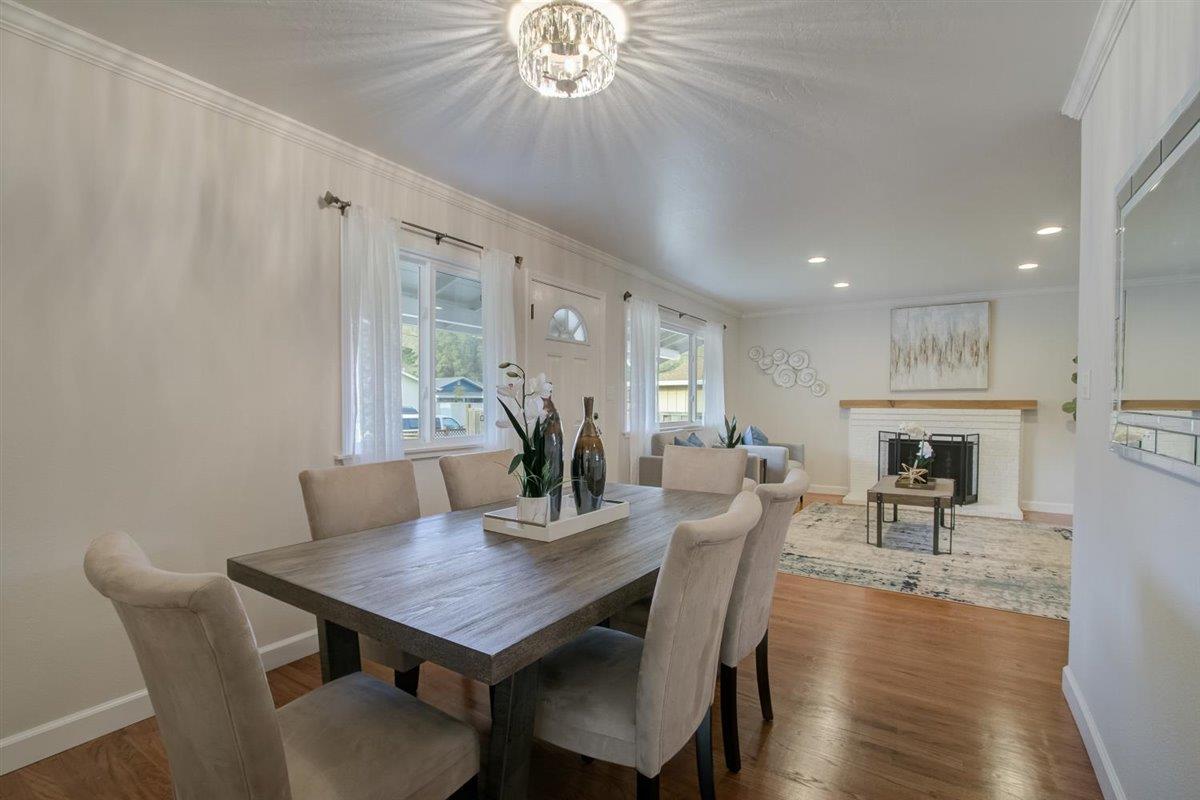 855 Standish Road Pacifica, CA 94044 - Photo 75 of 77 a view of a dining room with furniture window and wooden floor